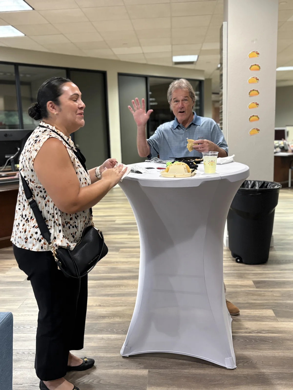 Guests chatting around a cocktail table
