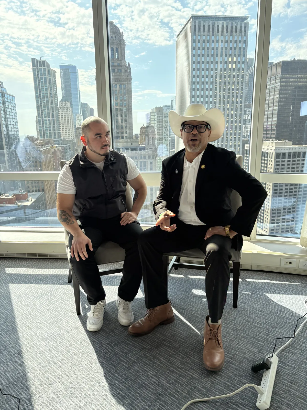 A guest interview on set overlooking downtown Chicago