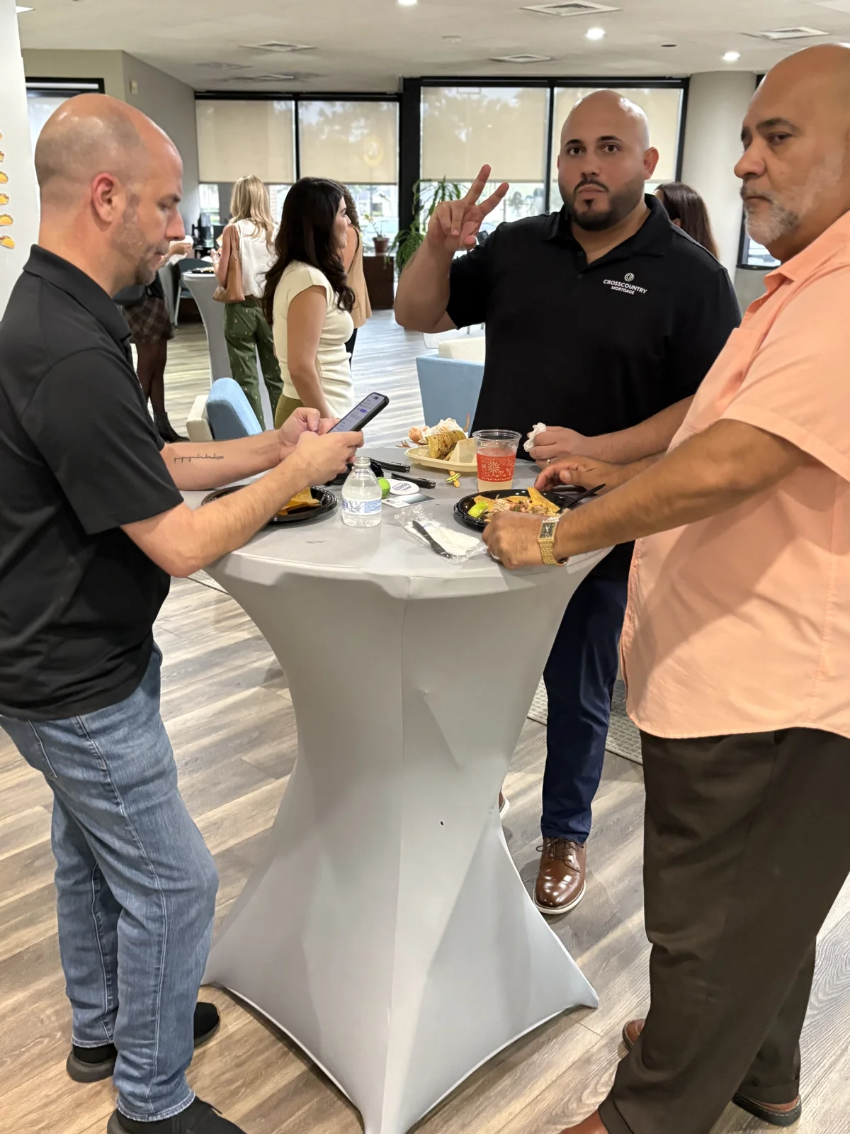 Guests sharing food and conversation