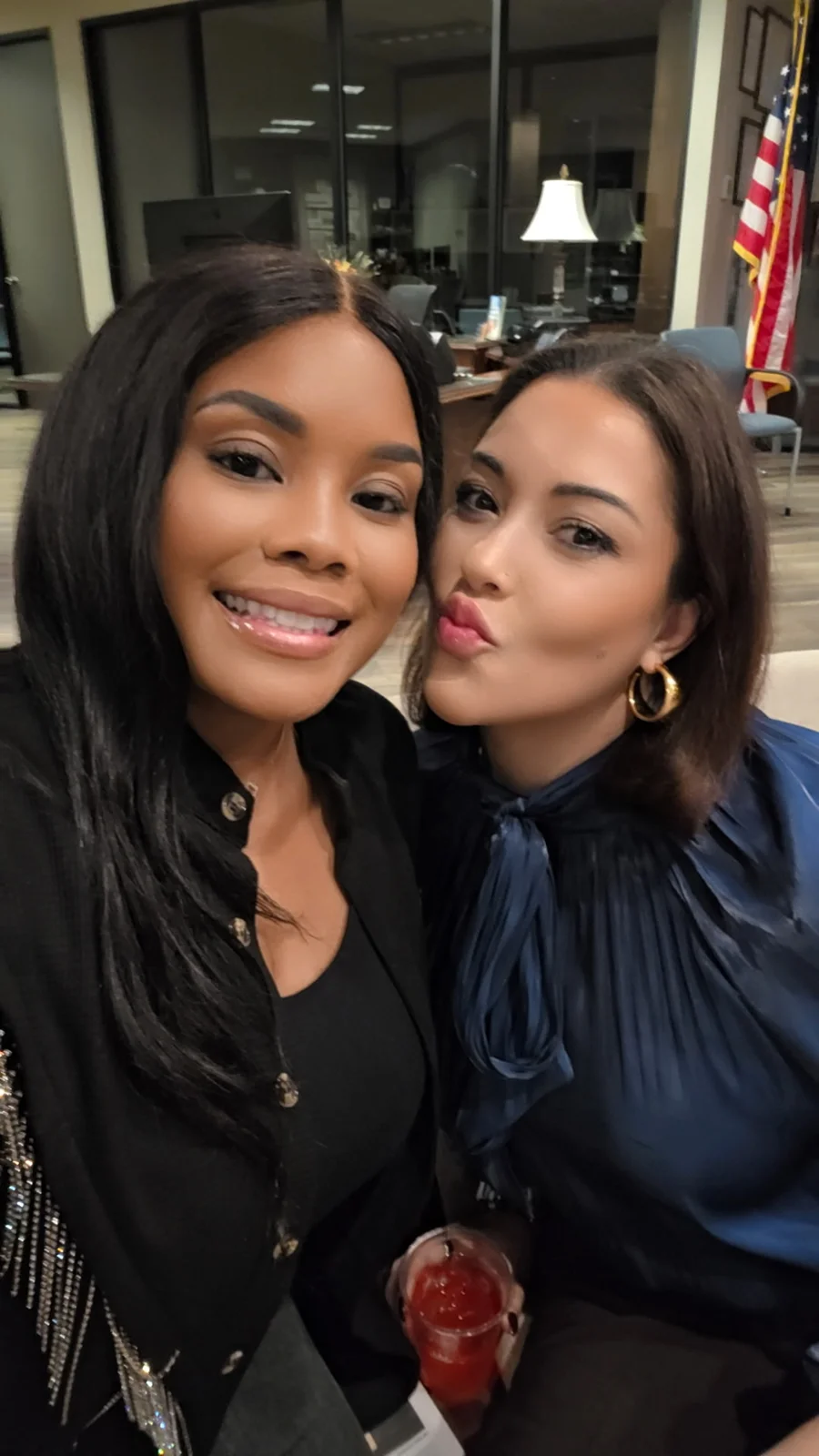Two guests taking a selfie together